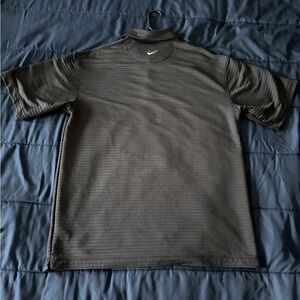 Nike men’s polo shirt, black. In good shape, zero flaws.